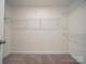 Spacious walk-in closet provides ample shelving and storage solutions at 292 Manchester Rd, Mount Gilead, NC 27306