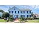 A two-story traditional home featuring black shutters and mature landscaping at 3200 Heathstead Pl # E, Charlotte, NC 28210