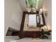 Lofted bedroom features an ensuite bath, ceiling fan, and natural light from large windows at 333 W 7Th St, Charlotte, NC 28202