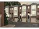 Beautiful brick townhomes with attached garages and landscaped front entrances at 333 W 7Th St, Charlotte, NC 28202
