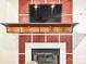 Fireplace with built-in shelving and TV mount at 333 W 7Th St, Charlotte, NC 28202