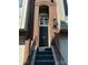 Elegant townhome front door with black hardware and brick surround at 333 W 7Th St, Charlotte, NC 28202