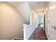 Hallway with carpeted floors leading to bedrooms and other living spaces in the home at 333 W 7Th St, Charlotte, NC 28202