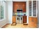 Modern kitchen with stainless steel appliances, granite countertops, and wood cabinets at 333 W 7Th St, Charlotte, NC 28202
