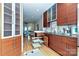 Modern kitchen with stainless steel appliances, granite countertops, and wood cabinets at 333 W 7Th St, Charlotte, NC 28202