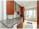 Modern kitchen with granite countertops and stainless steel appliances at 333 W 7Th St, Charlotte, NC 28202