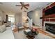 Inviting living room with fireplace and views of the dining area at 333 W 7Th St, Charlotte, NC 28202