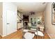 Open-concept living room with hardwood floors, dining area, and natural light at 333 W 7Th St, Charlotte, NC 28202