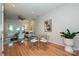 Open-concept living room with hardwood floors, dining area, and natural light at 333 W 7Th St, Charlotte, NC 28202