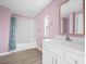 Bright bathroom featuring modern fixtures, including a sink and a shower-tub combination at 3433 Spinner Ct, Sherrills Ford, NC 28673