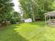 Large, well maintained backyard with a swing set, shed, and some privacy at 3533 Weddington Ridge Ln, Matthews, NC 28105