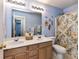 Bright bathroom with Winnie the Pooh decor, double sink vanity, and a shower/tub combo at 3533 Weddington Ridge Ln, Matthews, NC 28105