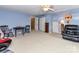 Bonus room with a ceiling fan, white closet doors, and space for entertaining or recreation at 3533 Weddington Ridge Ln, Matthews, NC 28105