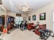 Fully equipped exercise room with a variety of fitness equipment and a ceiling fan for comfort at 3533 Weddington Ridge Ln, Matthews, NC 28105