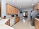 The kitchen includes stainless appliances, light wood cabinets, and view to the dining room at 3533 Weddington Ridge Ln, Matthews, NC 28105