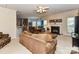Comfortable living room featuring a fireplace, plush seating, and plenty of natural light at 3533 Weddington Ridge Ln, Matthews, NC 28105