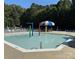 Shallow community pool with interactive water features, perfect for Gathering fun and safe for young children to enjoy at 3533 Weddington Ridge Ln, Matthews, NC 28105