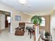 Cozy upstairs sitting area with neutral tones and a stairway down to the front door at 3533 Weddington Ridge Ln, Matthews, NC 28105