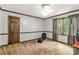 Neutral bedroom with a window, chair, and a closet at 3547 Willowood Pond Dr, Rock Hill, SC 29730
