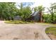 Charming two-story home with a large driveway and a lush, wooded lot, including a detached garage at 3547 Willowood Pond Dr, Rock Hill, SC 29730