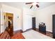 Bedroom features hardwood floors, a ceiling fan, and a speaker system at 4010 Carlton Dr, Claremont, NC 28610