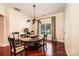 A naturally lit dining room featuring a round table with seating for six at 4010 Carlton Dr, Claremont, NC 28610