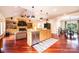 Open concept kitchen with a central island and stainless steel appliances at 4010 Carlton Dr, Claremont, NC 28610