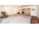 Bright and airy living room with carpeting, fireplace, and ample space for relaxation at 4010 Carlton Dr, Claremont, NC 28610