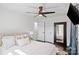 Comfortable bedroom with a large mirror reflecting a cozy and relaxing atmosphere at 4101 Tipperary Pl, Charlotte, NC 28215