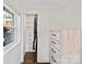 Walk-in closet with shelving and drawers, paired with a dresser and natural lighting at 4101 Tipperary Pl, Charlotte, NC 28215