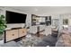 Stylish kitchen with stainless steel appliances, white countertops, subway tile backsplash, and island seating at 4101 Tipperary Pl, Charlotte, NC 28215