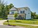 Charming two-story home with a well-maintained lawn and attached two car garage at 4535 Falls Lake Sw Dr, Concord, NC 28025