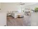 Large main bedroom with neutral walls, carpet, natural light, and ample space for furniture and decor at 4535 Falls Lake Sw Dr, Concord, NC 28025