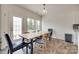 Bright dining room featuring a wooden table, stylish chairs, and natural light at 505 Silers Bald Dr, Fort Mill, SC 29715