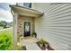 Stylish front door with decorative stone accents and welcoming decor at 505 Silers Bald Dr, Fort Mill, SC 29715