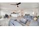 Open-concept living area with modern furniture, connecting kitchen and dining spaces at 505 Silers Bald Dr, Fort Mill, SC 29715