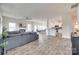Open-concept living room with stylish furniture, fireplace, and seamless flow to the kitchen at 505 Silers Bald Dr, Fort Mill, SC 29715