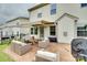 Stylish outdoor patio perfect for relaxing and entertaining with comfortable seating and barbecue grill at 505 Silers Bald Dr, Fort Mill, SC 29715