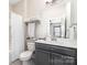 Bright bathroom featuring a bathtub, shower curtain and towels at 6029 Phyliss Ln, Mint Hill, NC 28227