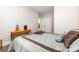 Bright bedroom with a beautiful table and view to a bathroom entry at 6029 Phyliss Ln, Mint Hill, NC 28227