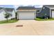 A detached garage features a well-maintained door, tidy landscaping, and a concrete driveway at 6029 Phyliss Ln, Mint Hill, NC 28227