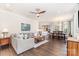 Spacious living room with hardwood floors, comfortable seating, and an open layout at 6029 Phyliss Ln, Mint Hill, NC 28227