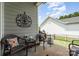 Inviting patio area with comfortable seating and a fire pit for outdoor relaxation at 6029 Phyliss Ln, Mint Hill, NC 28227