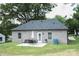 View of the backyard with a small patio and outdoor furniture set at 604 E Ohio Ave, Bessemer City, NC 28016