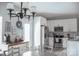 Eat-in kitchen with stainless steel appliances, granite countertops, and modern light fixtures at 604 E Ohio Ave, Bessemer City, NC 28016