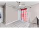 Neutral bedroom with tile floors, ceiling fan, and natural light from the window at 6113 Windsor Gate Ln # 6113, Charlotte, NC 28215