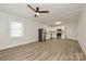 Open concept kitchen featuring stainless appliances, wood-look floors and natural light at 613 E Liberty St, Salisbury, NC 28144