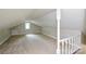 Lofted, finished attic space featuring fresh paint and a charming dormer window at 636 Forest Nw St, Concord, NC 28025