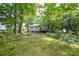 Explore your own private, tree-lined backyard offering plenty of room to roam and play at 636 Forest Nw St, Concord, NC 28025