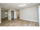 Neutral bedroom with new flooring, fresh paint, and closet at 636 Forest Nw St, Concord, NC 28025